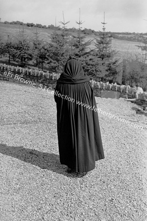 HOODED CLOAK ( MRS MURNANE , LISANISKY , UPTON ) AT KNOCKAVILLA CHURCH